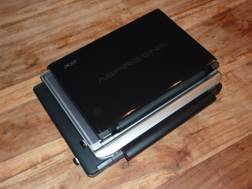 Dell Latitude E6220, Dell Latitude E5450, Acer Aspire One 756, Acer Chromebook C710 on top of each other